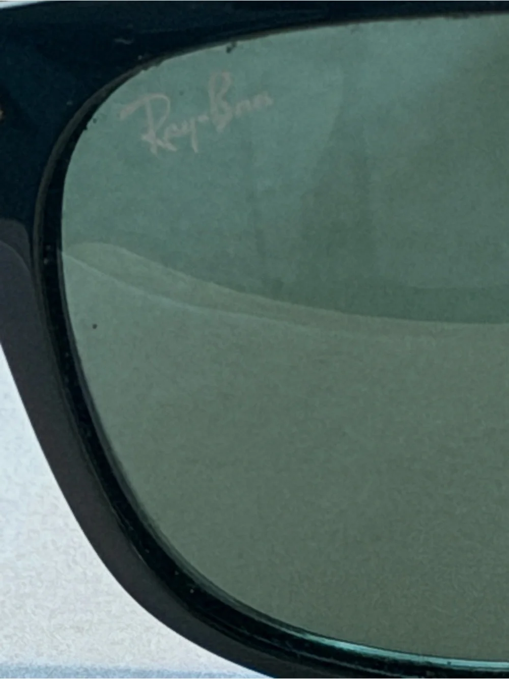 Ray-Ban Black Frame Sunglasses with Dark Lenses